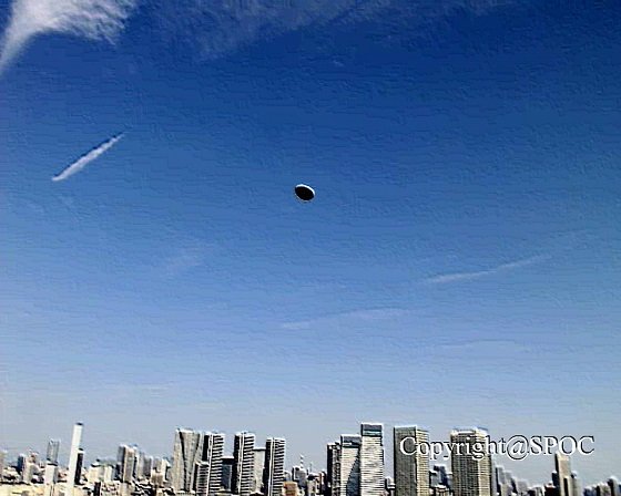 Image 2:The Jet-Black Disk Over Tokyo: A Definitive Analysis of a Genuine "Black UFO"