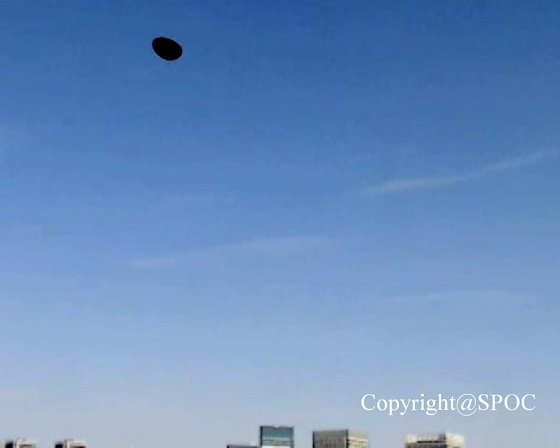 Image 1:The Jet-Black Disk Over Tokyo: A Definitive Analysis of a Genuine "Black UFO"