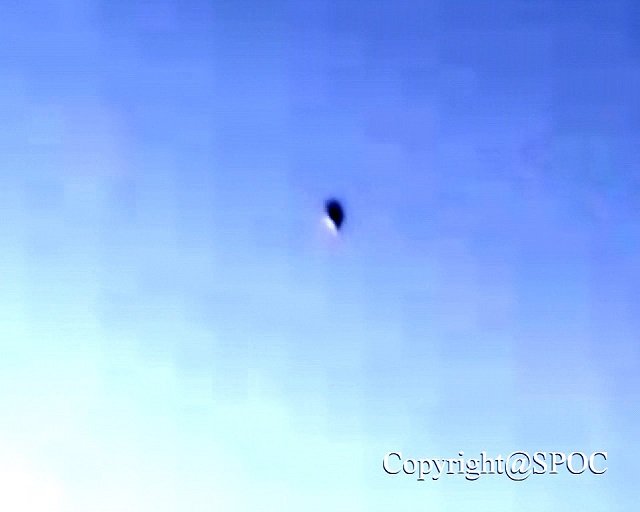 Image 1:The Metallic Spindle of Tokyo Bay: A Deep Dive into a Compelling Japanese UFO Case